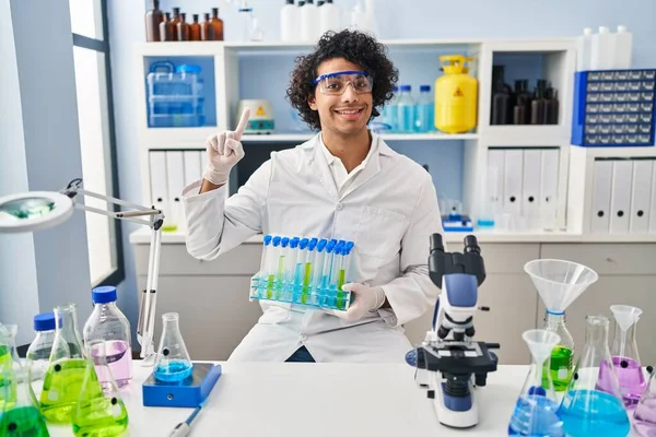 Hispanic Man Curly Hair Working Scientist Laboratory Surprised Idea Question — Stock Photo, Image