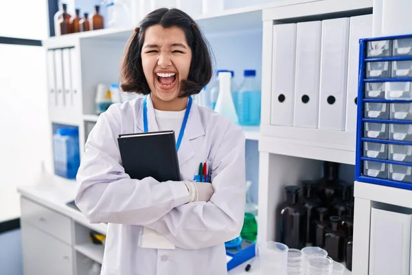 Young Hispanic Woman Working Scientist Laboratory Celebrating Crazy Amazed Success — Stockfoto