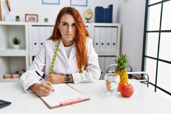 Young Redhead Woman Nutritionist Doctor Clinic Depressed Worry Distress Crying — Stock Photo, Image