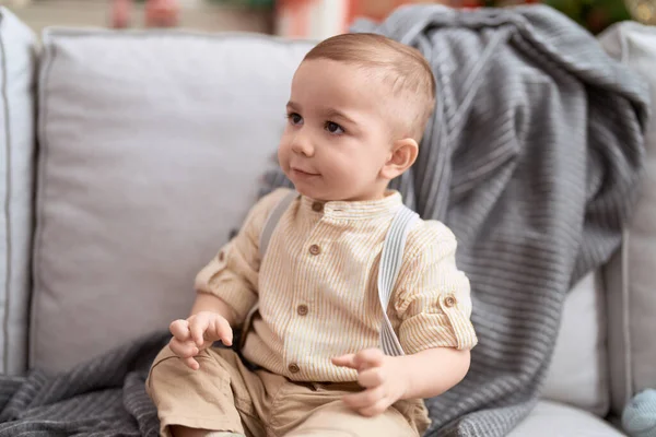 Adorable Toddler Sitting Sofa Serious Expression Home — Stock Photo, Image