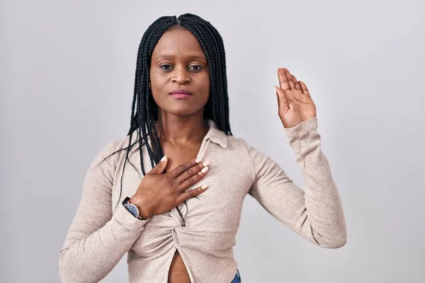 African Woman Braids Standing White Background Swearing Hand Chest Open — Foto de Stock