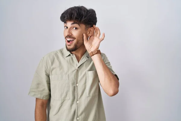 Arab Man Beard Standing White Background Smiling Hand Ear Listening — Zdjęcie stockowe