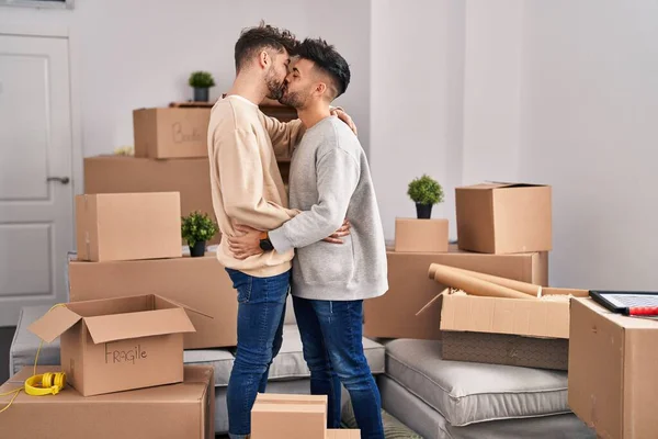 Young Couple Hugging Each Other Standing New Home — Foto de Stock