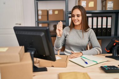 Young blonde woman ecommerce business worker having online deaf language conversation at office