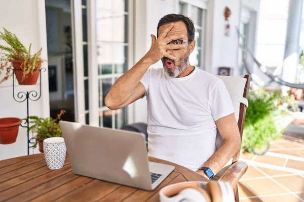 Middle Age Man Using Computer Laptop Home Peeking Shock Covering — Stock Photo, Image