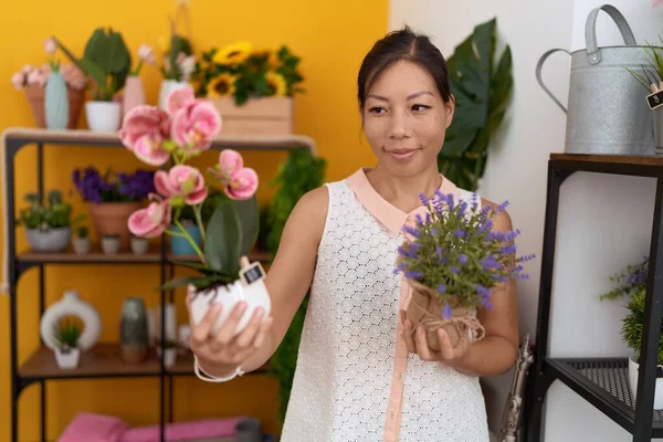 Young Asian Woman Florist Smiling Confident Holding Plants Flower Shop — Stockfoto