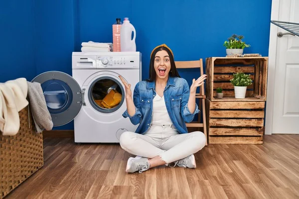 Hispanic Woman Doing Laundry Sitting Floor Celebrating Victory Happy Smile — Stock Photo, Image