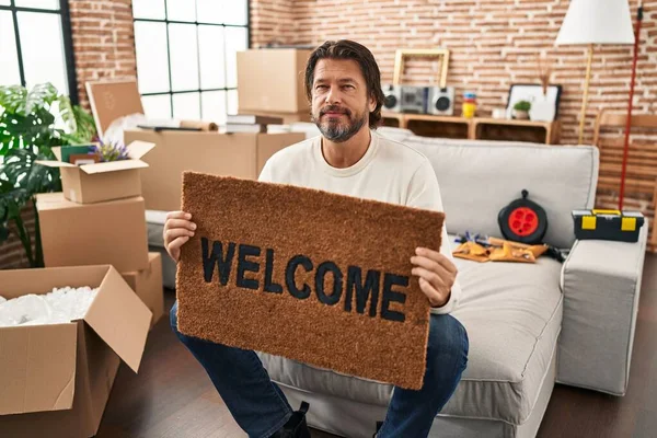 Handsome Middle Age Man Holding Welcome Doormat New Home Relaxed — Stock Photo, Image