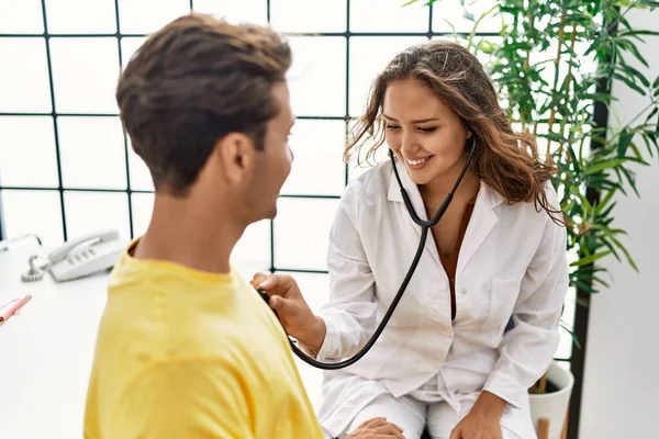Man Woman Having Doctor Visit Examining Using Stethoscope Clinic — Stok fotoğraf