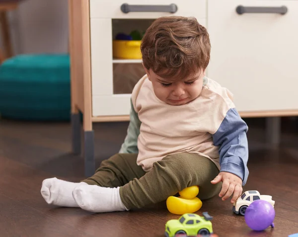 Adorable Hispanic Toddler Sitting Floor Crying Home — Stock Photo, Image