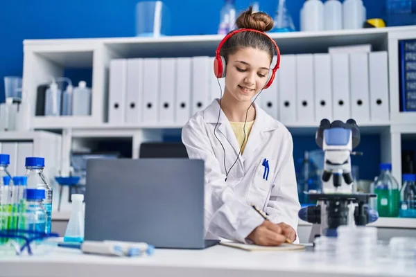 Adorable Girl Scientist Using Laptop Writing Document Laboratory —  Fotos de Stock