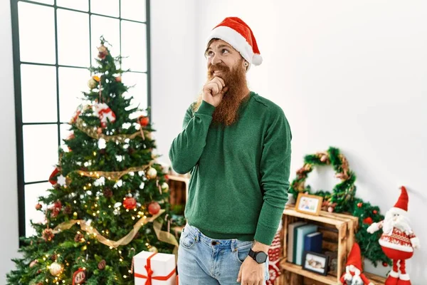 Redhead Man Long Beard Wearing Christmas Hat Christmas Tree Hand — Stock Photo, Image