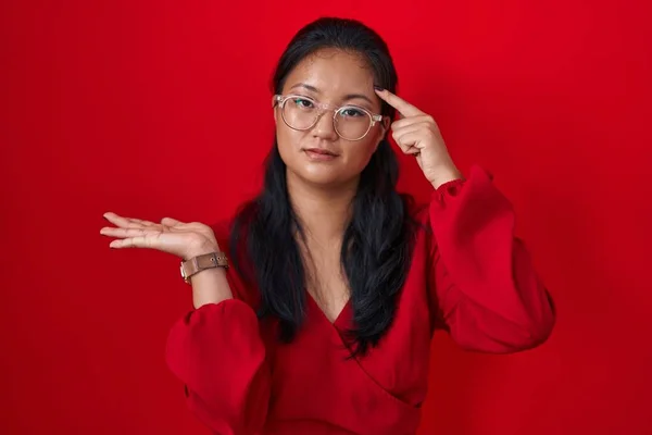 Asian Young Woman Standing Red Background Confused Annoyed Open Palm —  Fotos de Stock