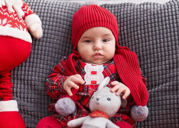 Adorable Caucasian Baby Sitting Sofa Santa Claus Toy Home — Stock Photo, Image