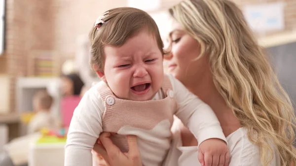 Mother Daughter Consueling Baby Crying Kindergarten — Stock Photo, Image