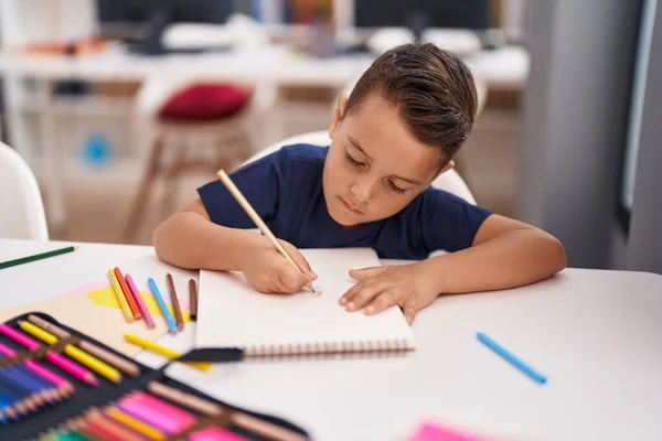 Adorable Hispanic Toddler Student Drawing Notebook Classroom — ストック写真