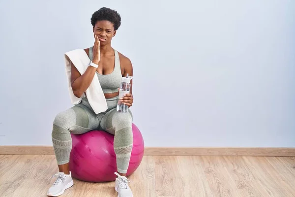 African American Woman Wearing Sportswear Sitting Pilates Ball Touching Mouth — Stock Photo, Image