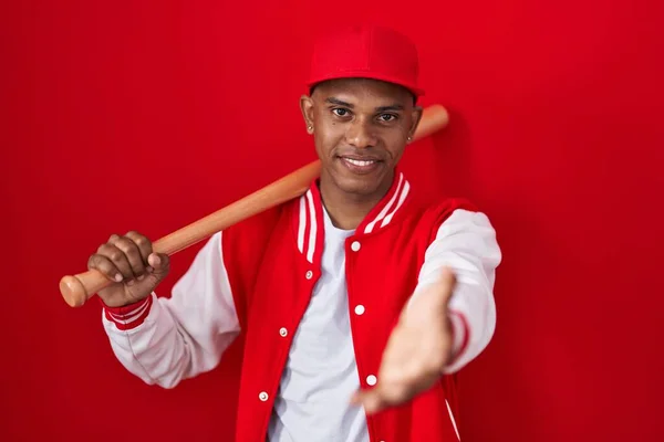 Young Hispanic Man Playing Baseball Holding Bat Smiling Cheerful Offering —  Fotos de Stock