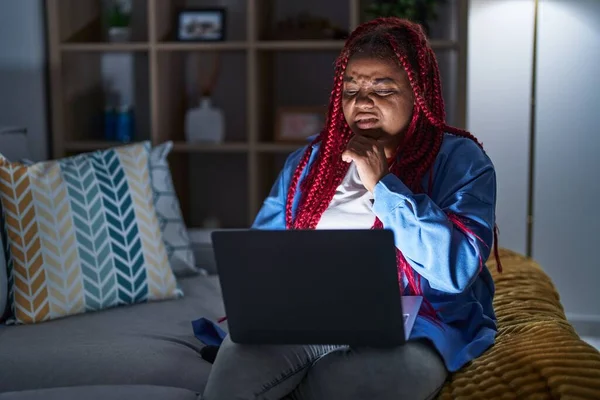 African American Woman Braided Hair Using Computer Laptop Night Thinking —  Fotos de Stock