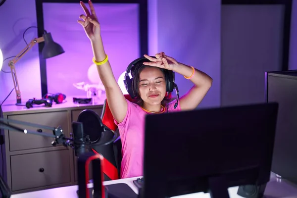 Young Hispanic Woman Streamer Playing Video Game Dancing Gaming Room — Stok fotoğraf