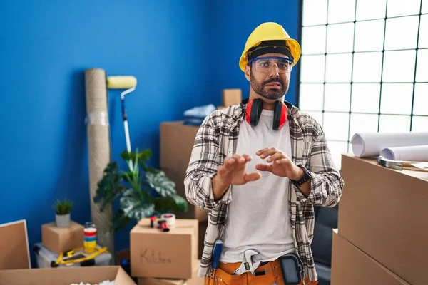Young Hispanic Man Beard Working Home Renovation Disgusted Expression Displeased — Foto de Stock
