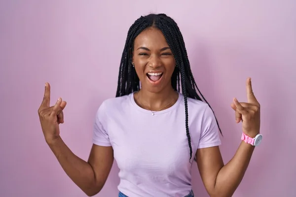 African American Woman Braids Standing Pink Background Shouting Crazy Expression — Stockfoto