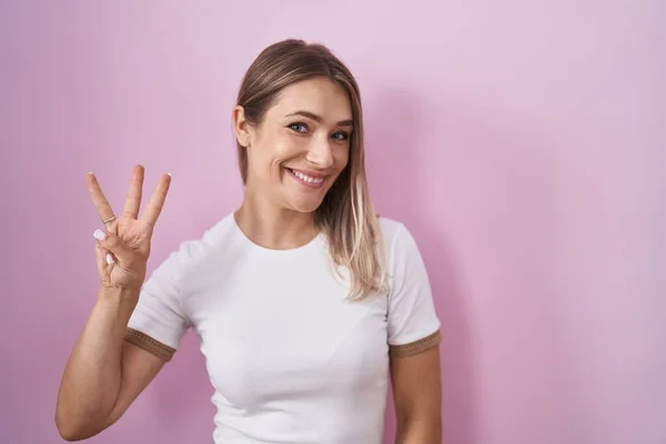 Blonde Caucasian Woman Standing Pink Background Showing Pointing Fingers Number — Stock Photo, Image