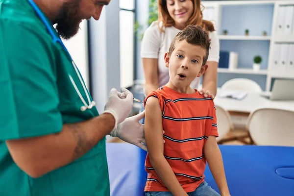 Young Kid Getting Vaccine Doctor Clinic Scared Amazed Open Mouth — Stockfoto