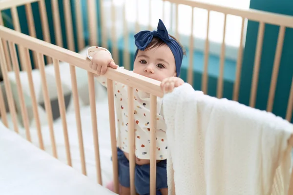 Adorable Toddler Standing Cradle Relaxed Expression Bedroom — Stock Photo, Image