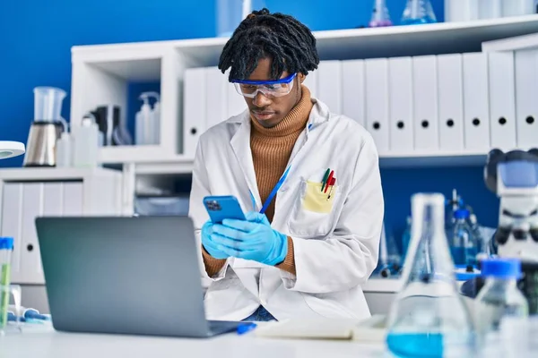 African American Man Scientist Using Laptop Smartphone Laboratory — Fotografia de Stock