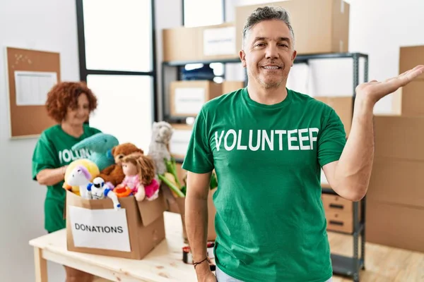 Middle Age Man Wearing Volunteer Shirt Donations Stand Smiling Cheerful — Fotografia de Stock