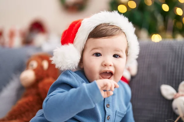 Adorable Caucasian Baby Sitting Sofa Christmas Tree Relaxed Expression Home — Stock Photo, Image