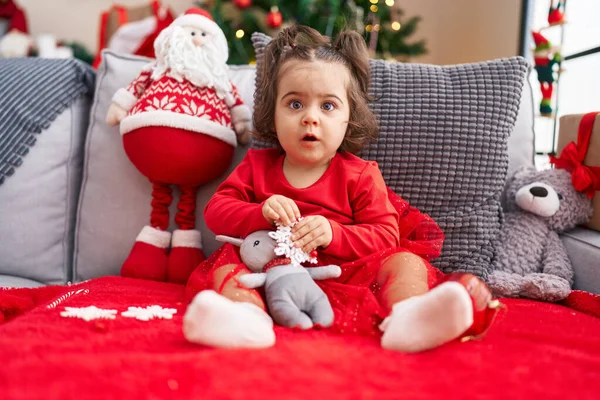 Adorable Hispanic Girl Sitting Sofa Christmas Tree Home — Stock Photo, Image