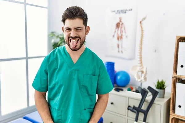 Young Man Beard Working Pain Recovery Clinic Sticking Tongue Out — Foto de Stock