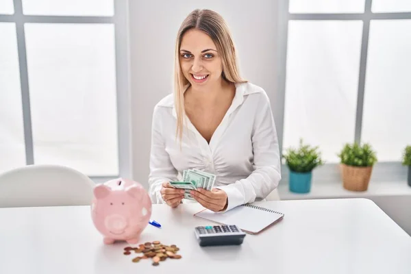 Young Woman Smiling Confident Counting Dollars Home — Stockfoto