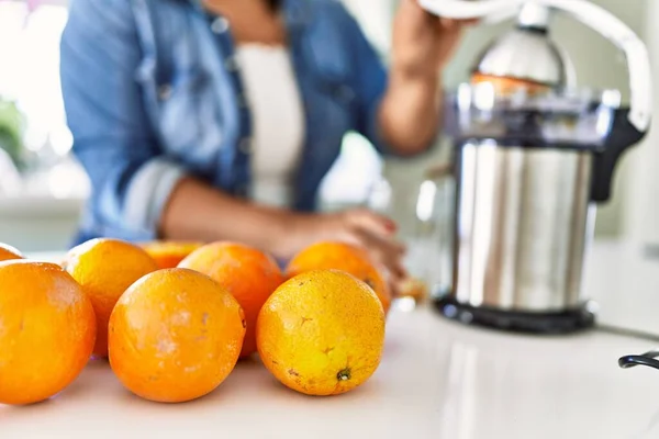 Hispanic Brunette Woman Preparing Orange Juice Kitchen —  Fotos de Stock