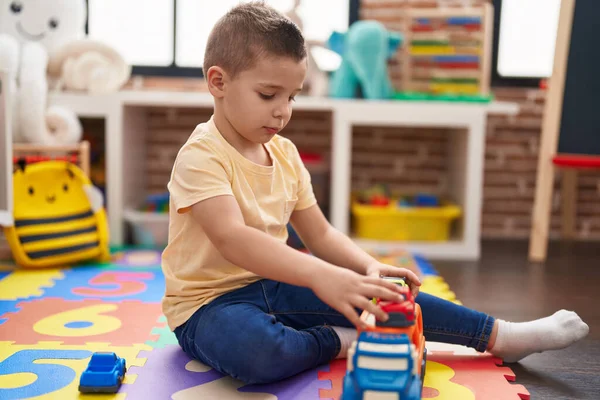 Adorable Toddler Playing Car Toy Sitting Floor Kindergarten — 스톡 사진