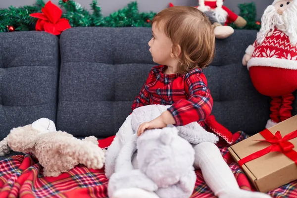 Adorable Hispanic Girl Holding Doll Sitting Sofa Christmas Decor Home — Stock Photo, Image