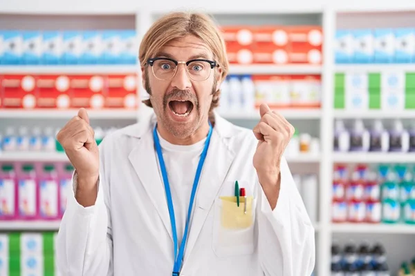 Caucasian Man Mustache Working Pharmacy Drugstore Celebrating Surprised Amazed Success — Fotografia de Stock