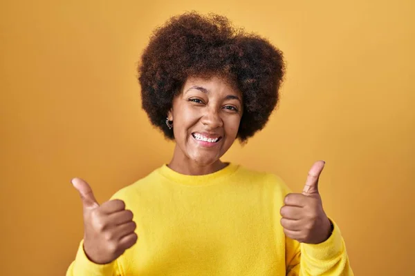 Young African American Woman Standing Yellow Background Success Sign Doing — 图库照片