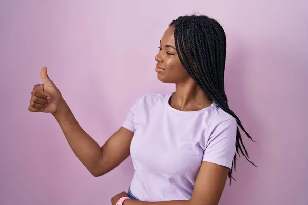 African American Woman Braids Standing Pink Background Looking Proud Smiling — Stockfoto