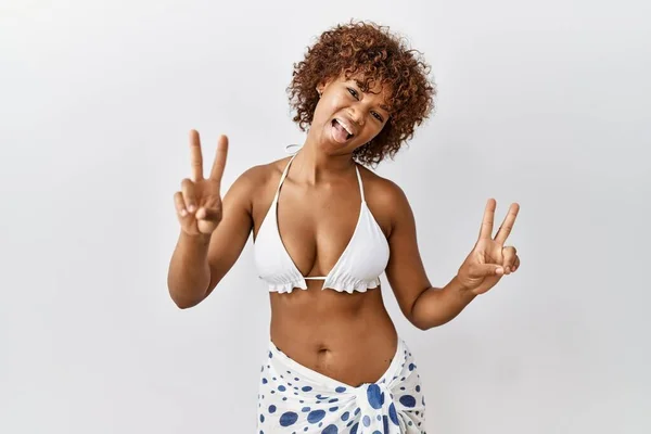 Young African American Woman Curly Hair Wearing Bikini Smiling Tongue — Zdjęcie stockowe