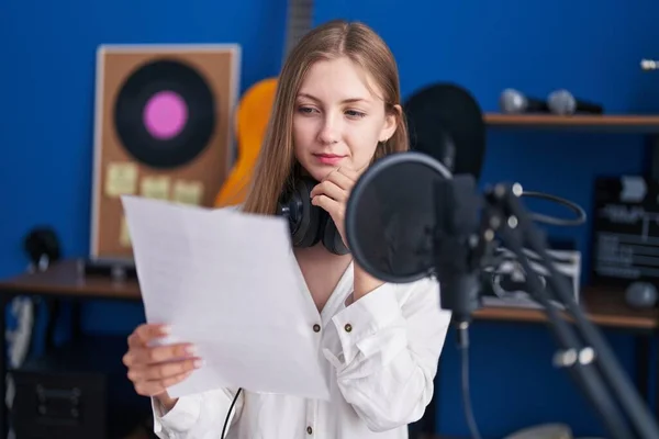 Young Caucasian Woman Artist Reading Song Doubt Expression Music Studio — Stock fotografie
