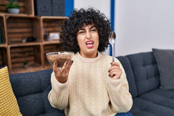 Young Brunette Woman Curly Hair Eating Healthy Whole Grain Cereals — Stockfoto