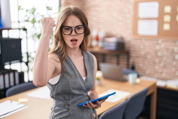 Caucasian Woman Working Office Wearing Glasses Angry Mad Raising Fist — ストック写真