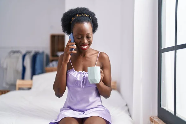 African American Woman Alking Smartphone Drinking Coffee Bedroom — ストック写真