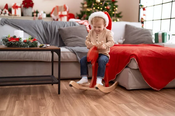 Adorable Toddler Smiling Confident Playing Reindeer Rocking Christmas Tree Home — ストック写真