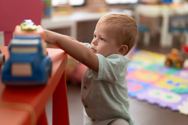 Adorable Toddler Playing Truck Toy Standing Kindergarten — Stock Photo, Image