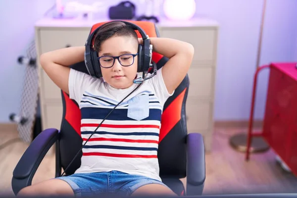 Adorable Hispanic Boy Streamer Relaxed Hands Head Gaming Room — Stok fotoğraf