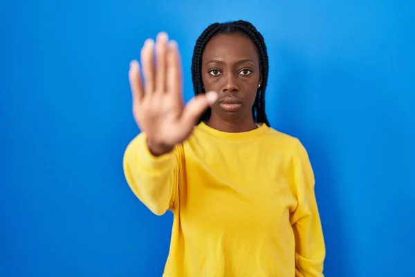 Beautiful Black Woman Standing Blue Background Doing Stop Sing Palm — Fotografia de Stock